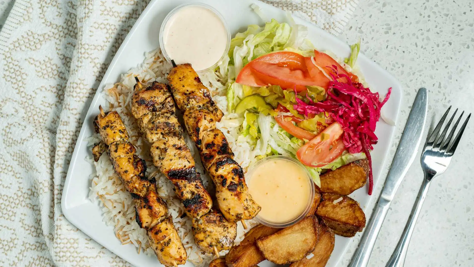 Chicken BBQ Skewers with Rice at Eat-A-Pita Calgary